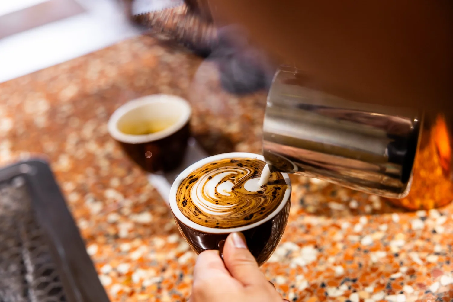 Coffee being prepared at Black & White Espresso